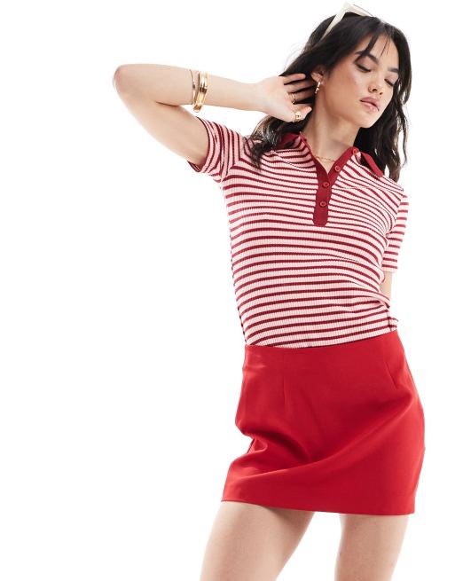 Top rosa a rayas rojas con cuello tipo polo de Mango