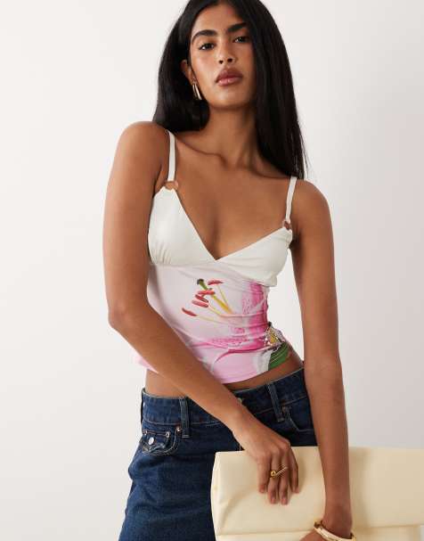 Top rosa ceñido de tirantes con estampado floral degradado y logo de strass Odetta de I.AM.GIA - view 1