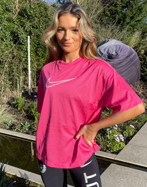 Top rosa con logo de malla de Nike