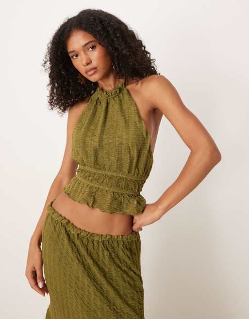 Top verde sin mangas con cuello halter y espalda descubierta de tejido texturizado de ASOS DESIGN (parte de un conjunto)