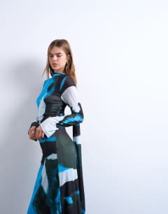 Model wearing Tophop blurred abstract print maxi dress with scarf detail in blue