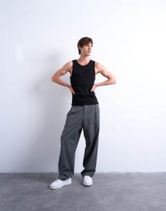 Model wearing 2 pack rib vest in black