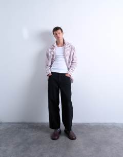 Model wearing 2 pack rib vest in white