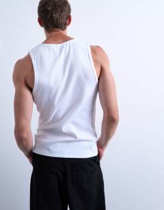 Model wearing 2 pack rib vest in white