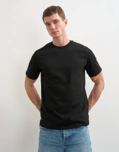 Model wearing 3 pack classic fit t-shirt in black, charcoal and burgundy