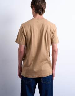 Model wearing 3 pack classic fit t-shirt in dark stone, burgundy and navy