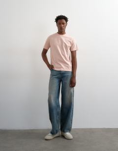 Model wearing 3 pack classic fit t-shirt in navy, ecru and pink