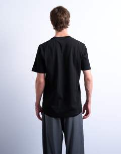 Model wearing 3 pack regular fit t-shirt in black