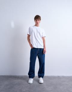 Model wearing 3 pack regular fit t-shirt in white