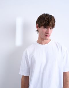 Model wearing 3 pack relaxed fit t-shirt in white, chocolate and stone 