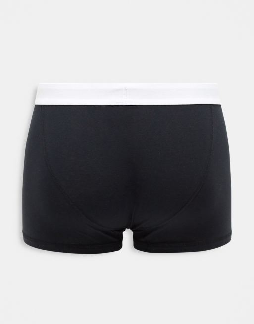 ASOS DESIGN jersey trunks in black with blue branded waistband