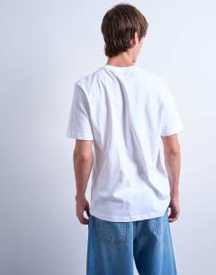 Model wearing 5 pack classic t-shirt in white