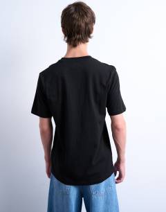 Model wearing 5 pack regular fit t-shirt in black