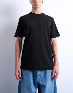 Model wearing 5 pack regular fit t-shirt in black