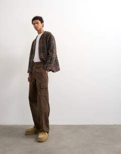 Model wearing Baggy cargo trouser in brown