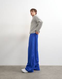 Model wearing Baggy fit airtex jogger in cobalt