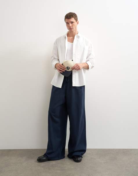 Topman baggy fit heavyweight jogger with raw hem in navy - view 1