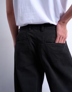 Model wearing Baggy fit high waisted twill trouser in black