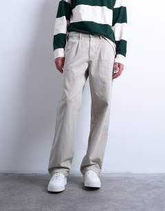 Model wearing Baggy fit high waisted twill trouser in stone