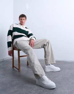 Model wearing Baggy fit high waisted twill trouser in stone