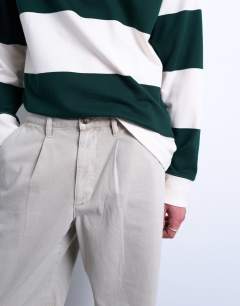 Model wearing Baggy fit high waisted twill trouser in stone