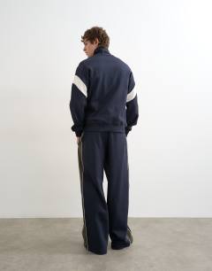 Model wearing Baggy fit paneled pique jogger in navy