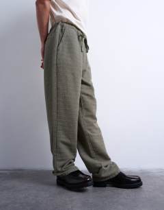 Model wearing Baggy fit texture trouser in khaki
