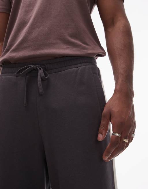 Topman baggy leg sweatpants with contrast side stripe in charcoal