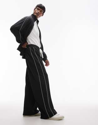 baggy leg sweatpants with double side piping in black - part of a set