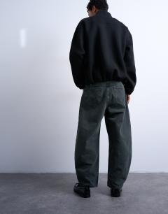 Model wearing Barrel jean in green