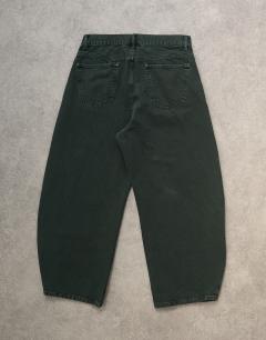 Model wearing Barrel jean in green