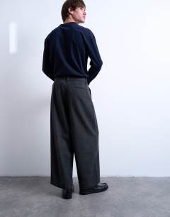 Model wearing Barrel trousers in herringbone warm handle in grey