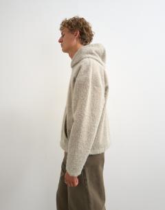Model wearing Boxy fit brushed borg hoodie in stone