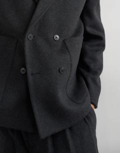 Model wearing Boxy fit double breasted textured blazer in charcoal