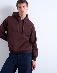 Model wearing Boxy fit hoodie in brown