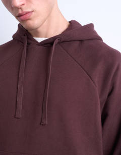 Model wearing Boxy fit hoodie in brown