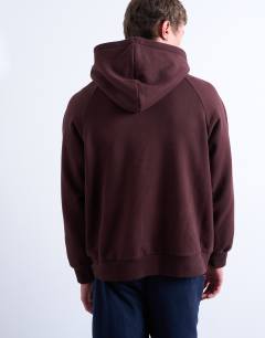 Model wearing Boxy fit hoodie in brown