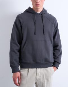 Model wearing Boxy fit hoodie in charcoal