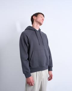 Model wearing Boxy fit hoodie in charcoal