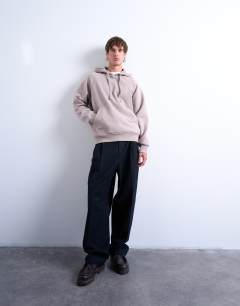 Model wearing Boxy fit hoodie in mink