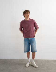 Model wearing Boxy fit in washed burgundy
