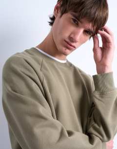 Model wearing Boxy fit raglan sweatshirt in khaki