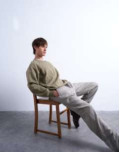 Model wearing Boxy fit raglan sweatshirt in khaki