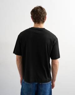 Model wearing Boxy oversized cropped t-shirt in black
