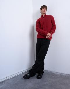 Model wearing Cable knitted zip through funnel neck cardigan in red