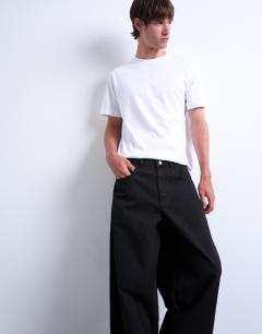 Model wearing Canvas barrel trouser in black