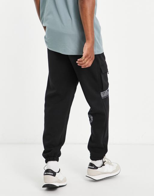 ASOS DESIGN tapered scuba sweatpants in ecru