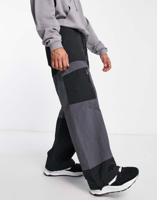 Topman – Cargohose in Schwarz mit extra weitem Schnitt und Patchwork-Design