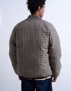 Model wearing Checked oversize puffer in black