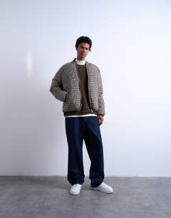 Model wearing Checked puffer in black